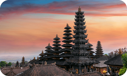 Sunset silhouette of the tiered temples in Bali, Indonesia.